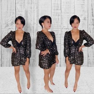 Black and shine this holiday season with this perfect dress.